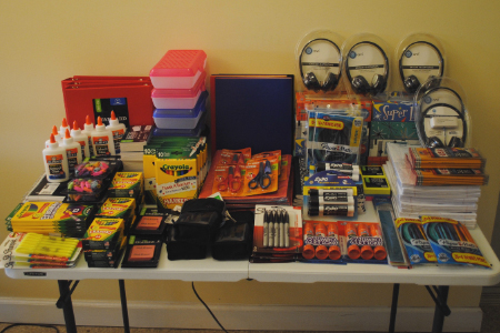 donates $ 250.00 worth of school supplies for distribution through the Bremen Food Pantry school supplies on table